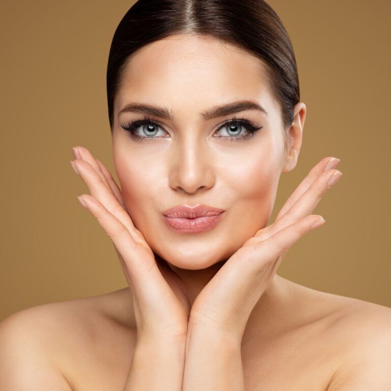 Woman with flawless skin and stylish makeup.