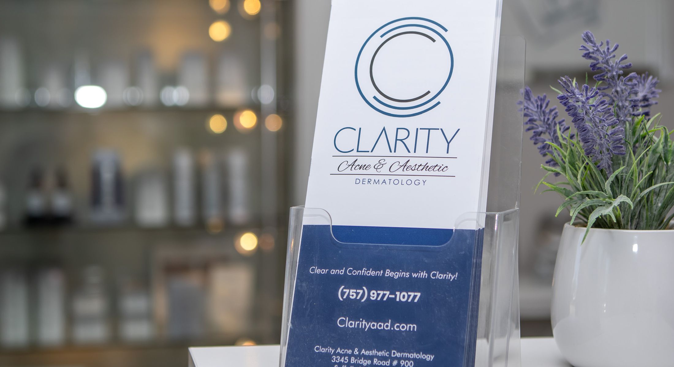Clarity dermatology brochure with decorative plant.