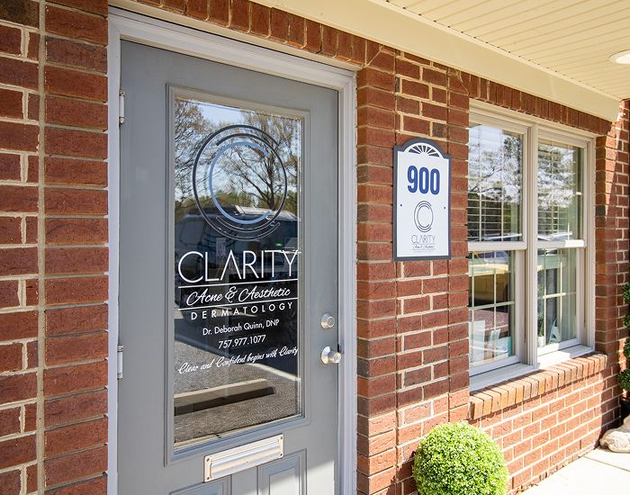 Clarity Dermatology office entrance and signage.