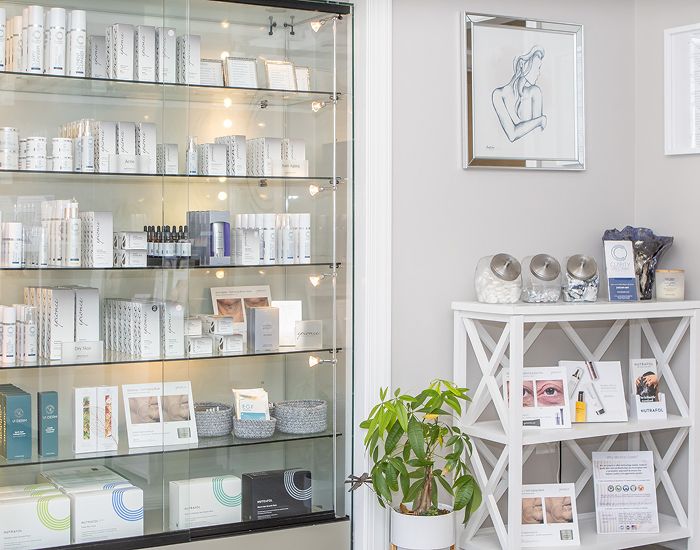 Skincare products display in a modern beauty shop.