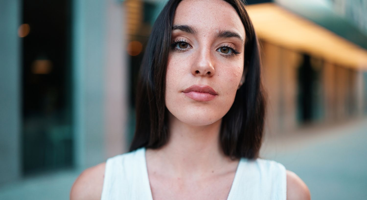 Close-up of a woman with long hair.